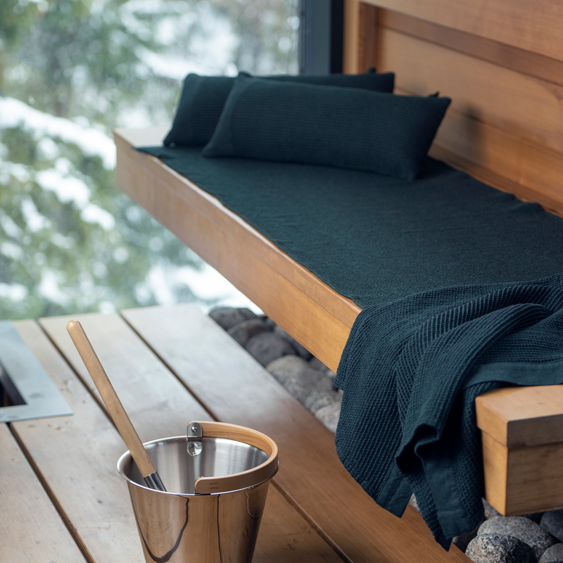 Rento Kenno dark green sauna linens on sauna bench