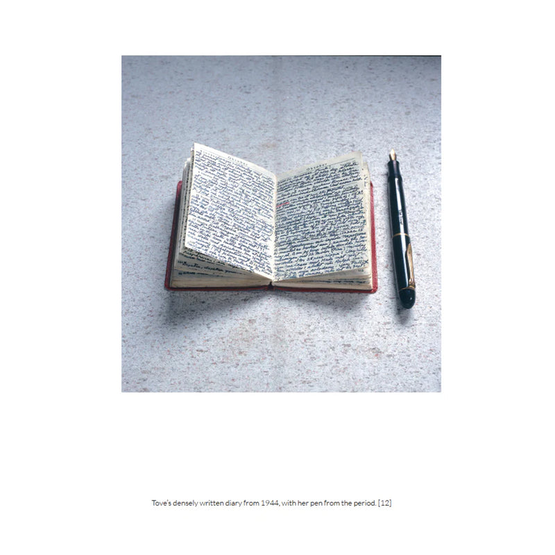 Open diary with pen on a textured surface