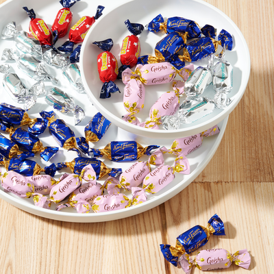 assorted wrapped chocolates on tray
