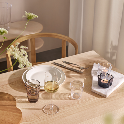 beautiful table setting with alvar aalto votives