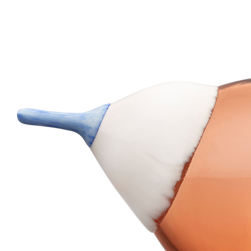 Close-up of a ceramic teapot with a blue spout on a white background