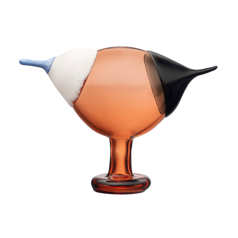 Glass object with a bird-like design on a white background