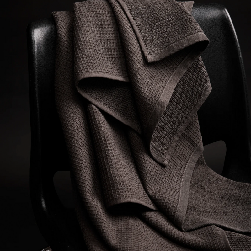 bath towels on chairs