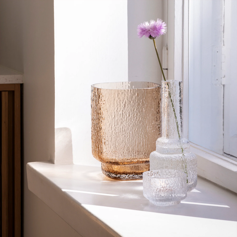 kuulea bronze vase in window