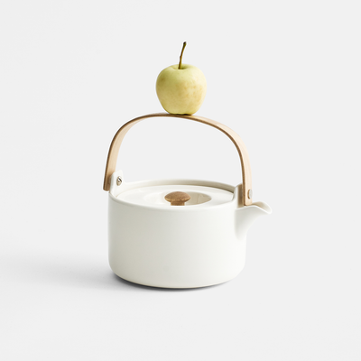 Marimekko White Teapot filled with apple tea