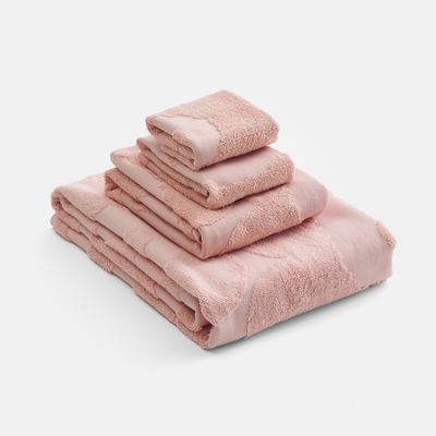 unikko bath towels powder pink folded stack