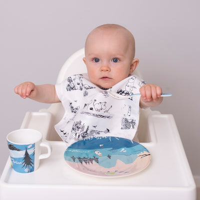 Toddler in height chair using Rätt Start Moomin Forest & Lake Children's dinnerware