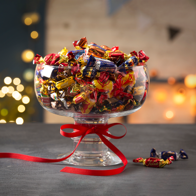 Filled bowl of candy containing Fazer Da-Capo Rum Truffle Dark Chocolates