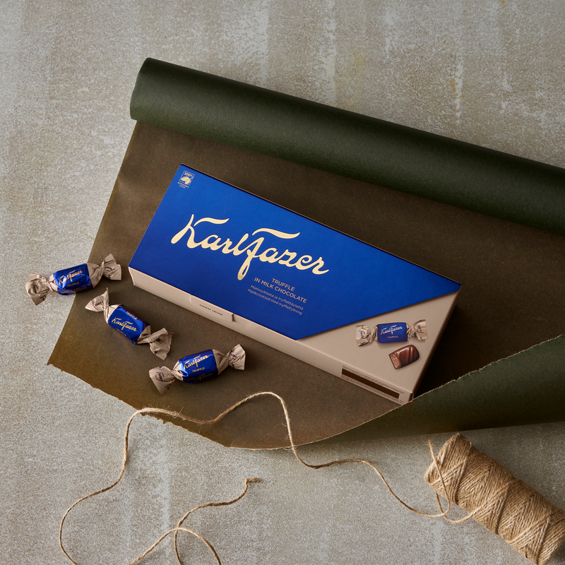 Fazer Truffle Milk Chocolates Box on table with gift wrap paper