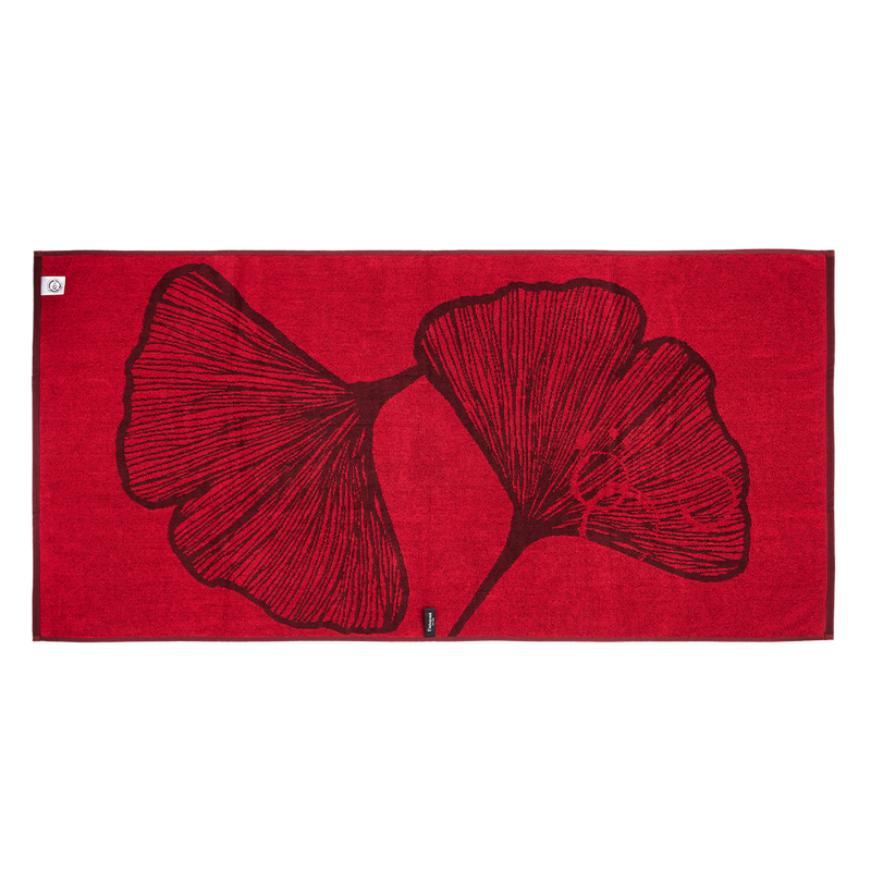 reverse side of Finlayson Elämän Bath Towel with bright red main color and dark red accents