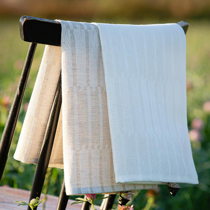 Twio Liplatus Kitchen Towels drooped over back of chair