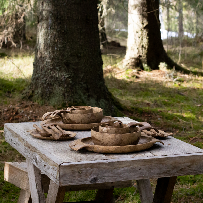 Kupilka outdoor dinnerware grouping on table in wilderness