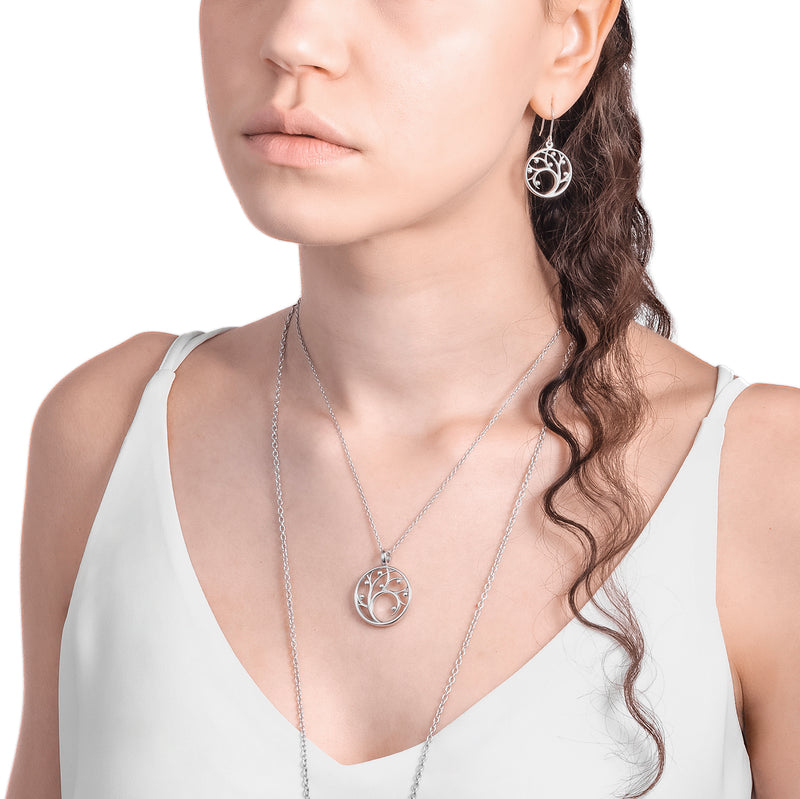 person modeling Lumoava Enchanted necklace and jewelry