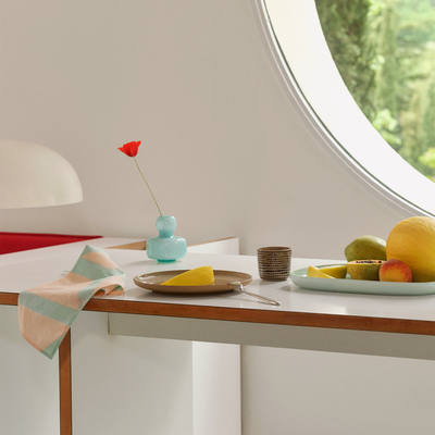 Table with Marimekko dinnerware and fruits