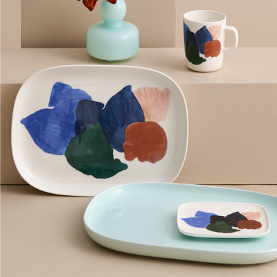 Grouping of Marimekko dinnerware plates and mug