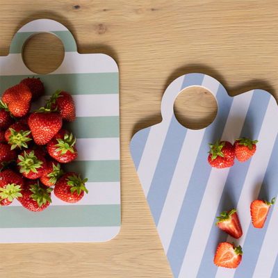 Slicing strawberries on Muurla Checks & Stripes Chop & Serve Board