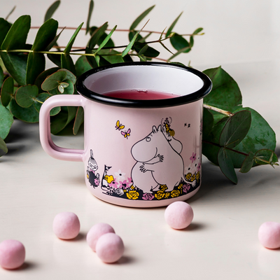 Muurla Moomin Enamel Mug Hug filled with juice