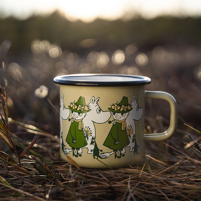 Muurla Moomin Friends Enamel Mug placed in grassy field