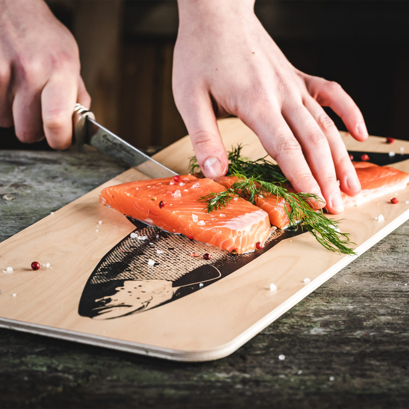 Slicing salmon fillet on Muurla Chop & Serve Board