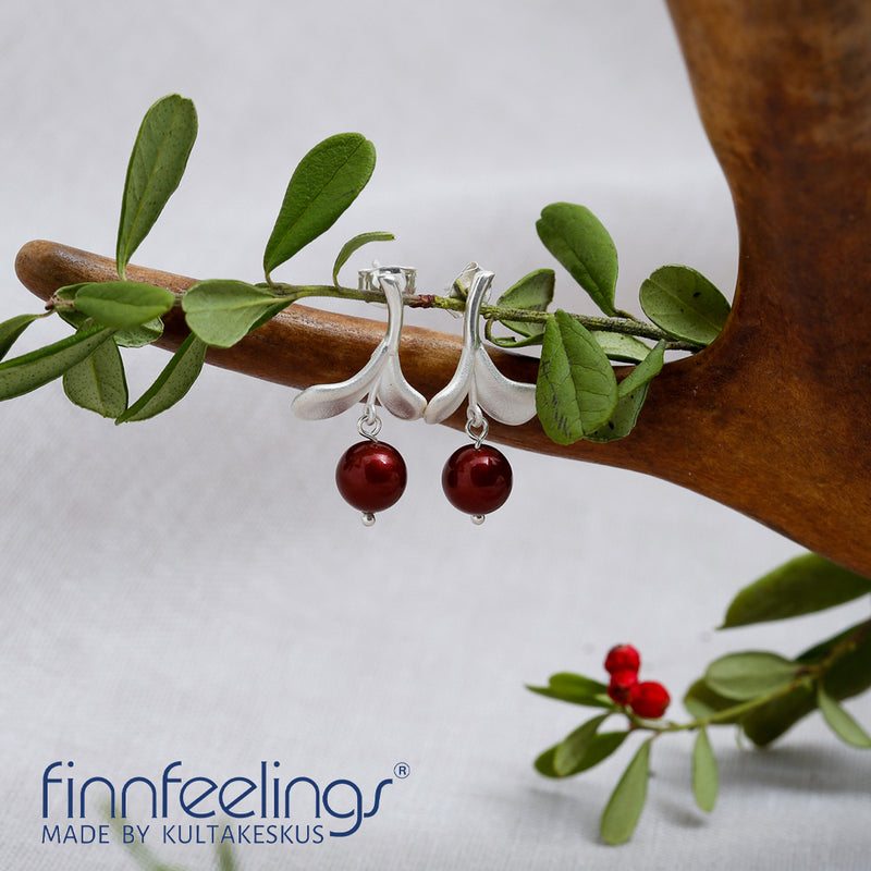 Finnfeelings Lingonberry Silver Earrings hanging from branch