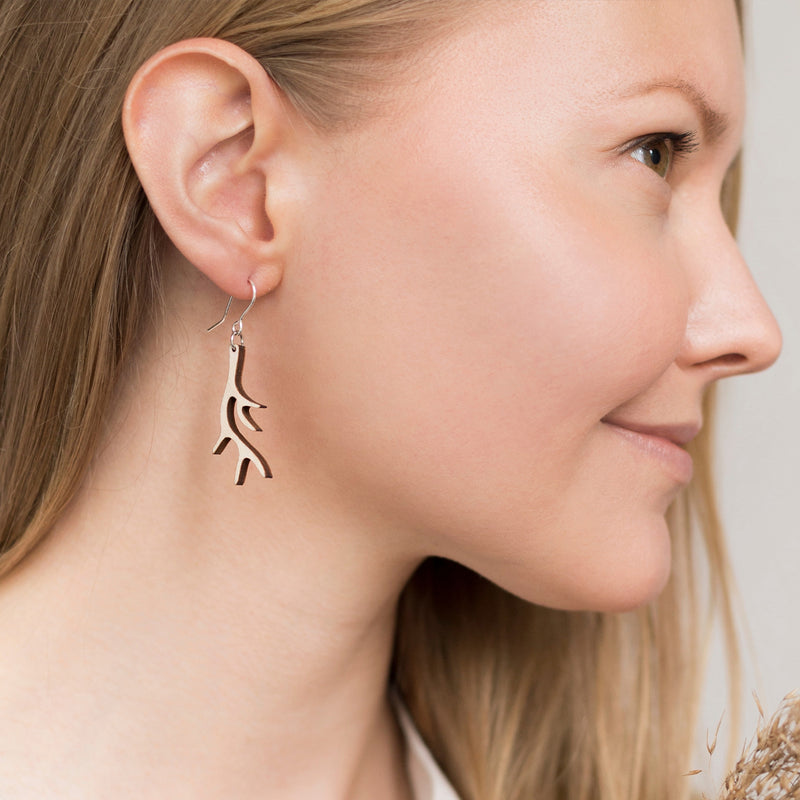 Woman modeling Valona Antler Birch Earrings, Natural