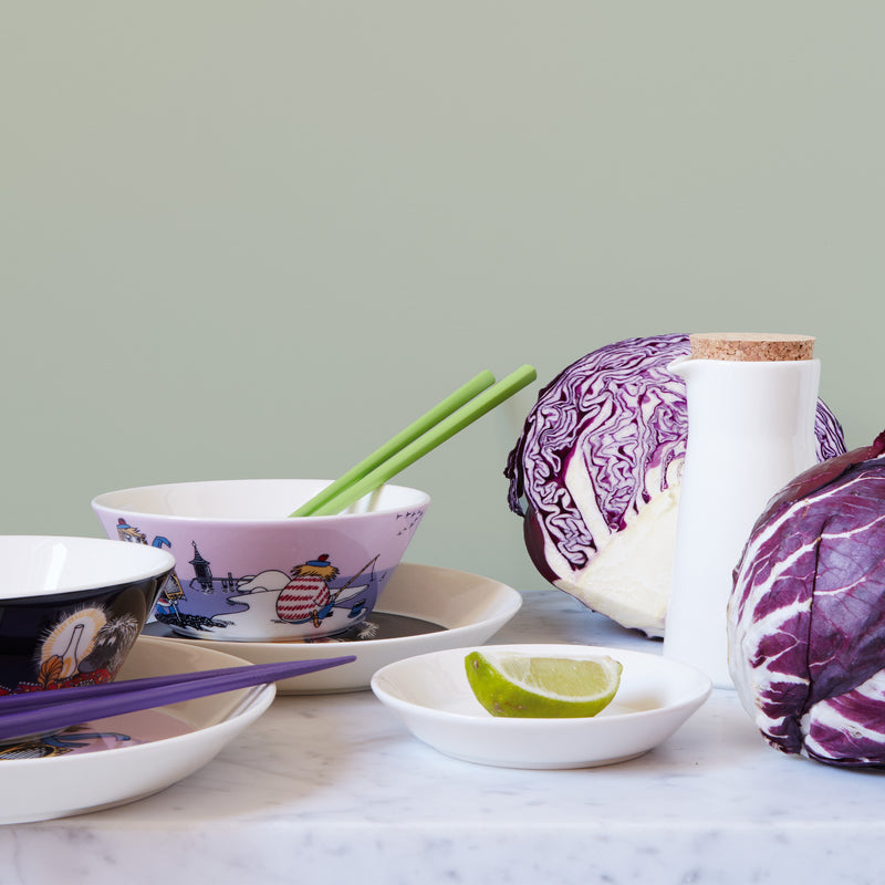 Arabia Moomin Bowl Tooticky next to red cabbage on marble surface
