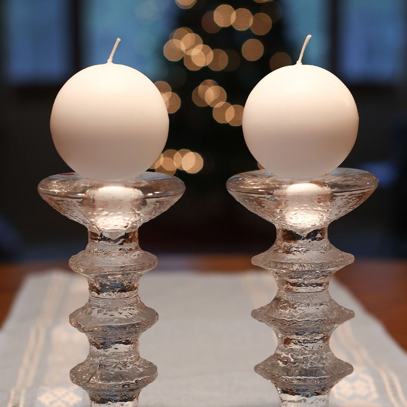 Set of two Finnish White Footed Ball Candles in Festivo candlesticks