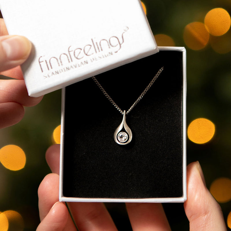 open jewelry box revealing FinnFeelings Teardrop Rock Crystal Necklace