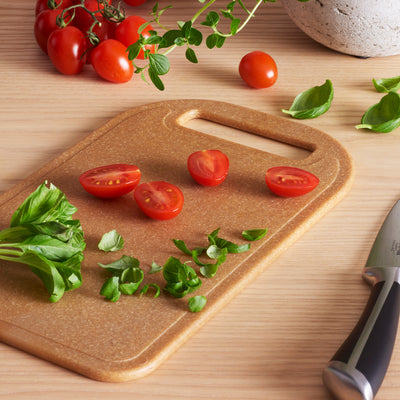 chopped tomato and herbs on Bio-Based Cutting Board