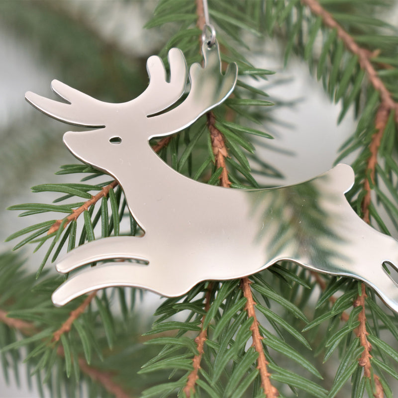 Pohjolan Helmi Lapland Reindeer Ornament hanging in tree