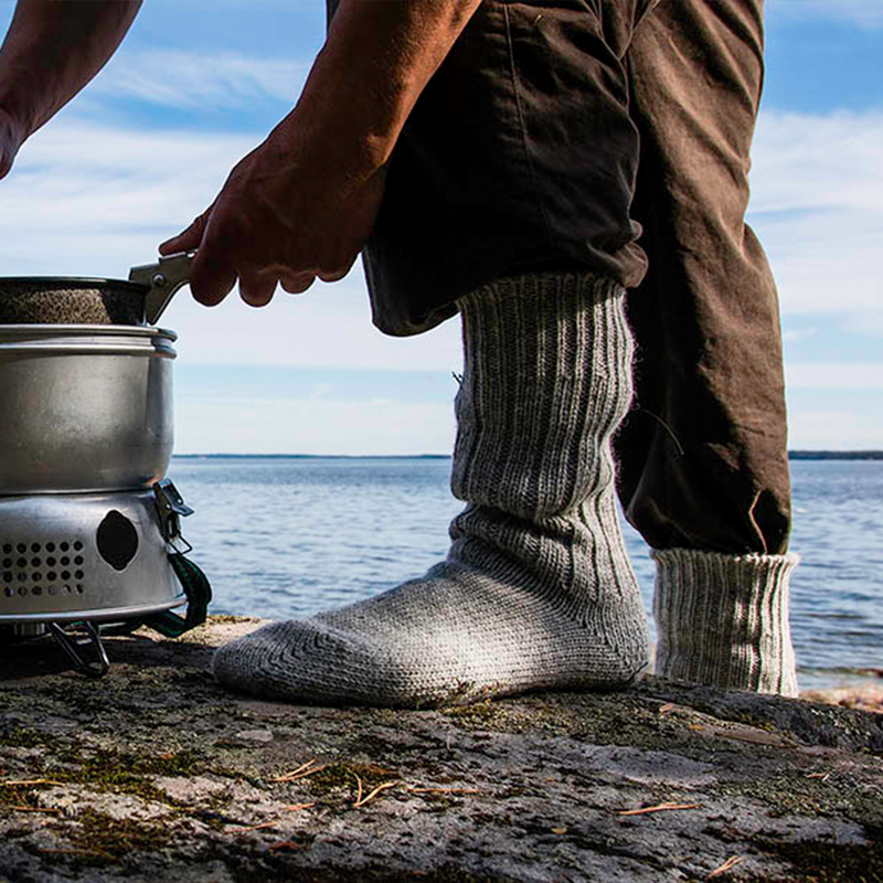 person in the outdoors wearing Helsinki Woolen Socks, Lichen Grey