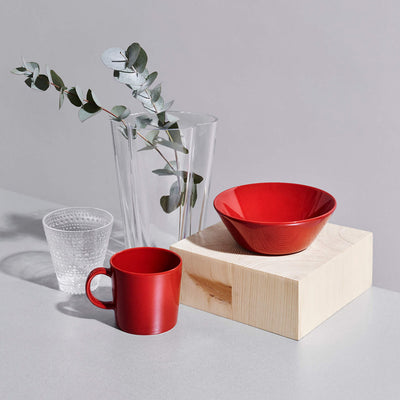 Kastehelmi clear tumbler displayed next tored bowl and mug 