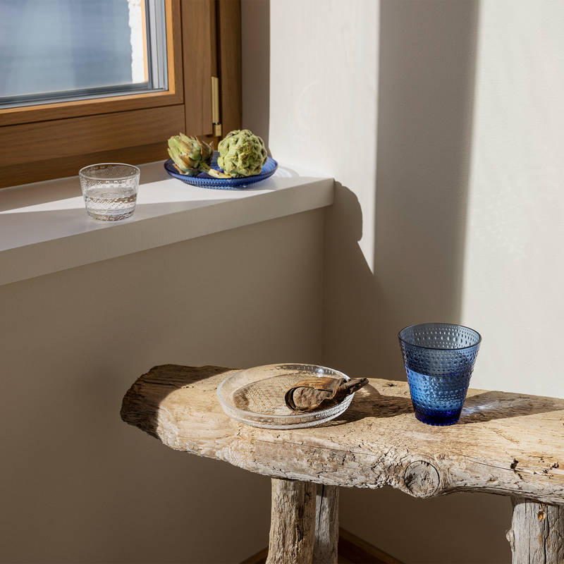 iittala Kastehelmi Dewdrop Ultramarine Blue Salad Plate on window sill with artichoke