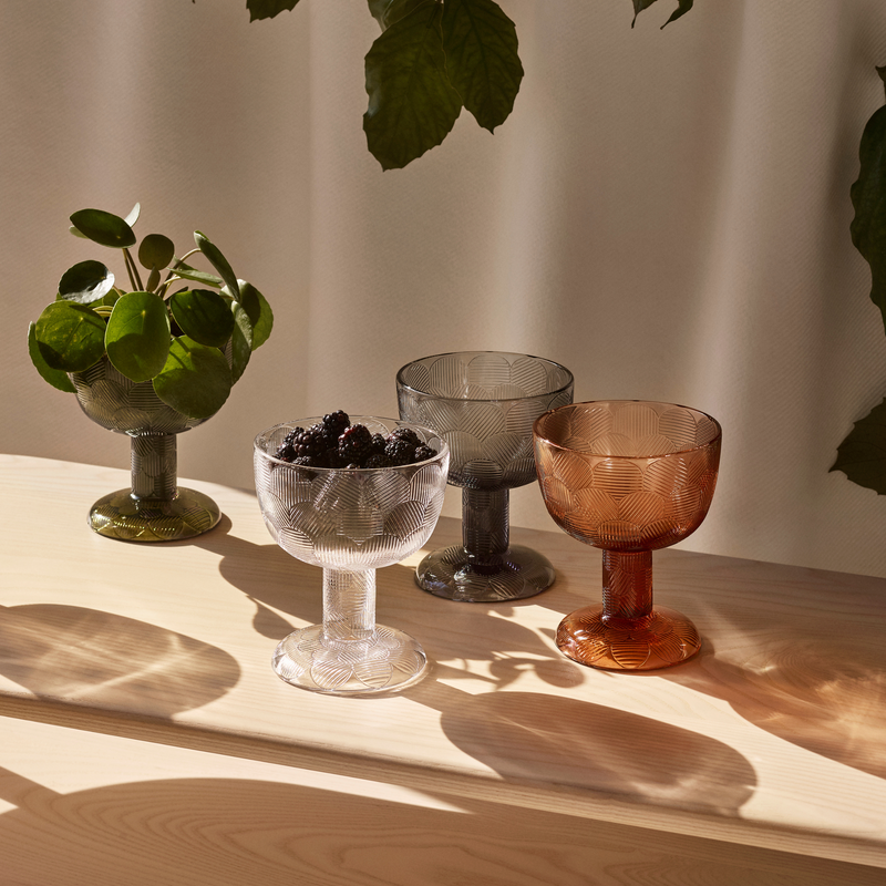 4 Miranda Bowls displayed on small shelf