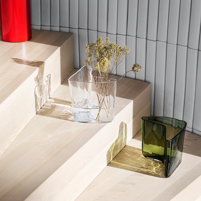 Clear and green limited edition vases on wooden steps