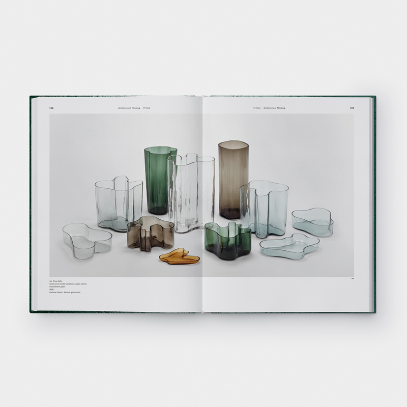 open page of iittala book showing assorted pictures of vases