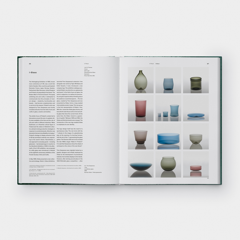 open page of iittala book showing assorted pictures of glassware