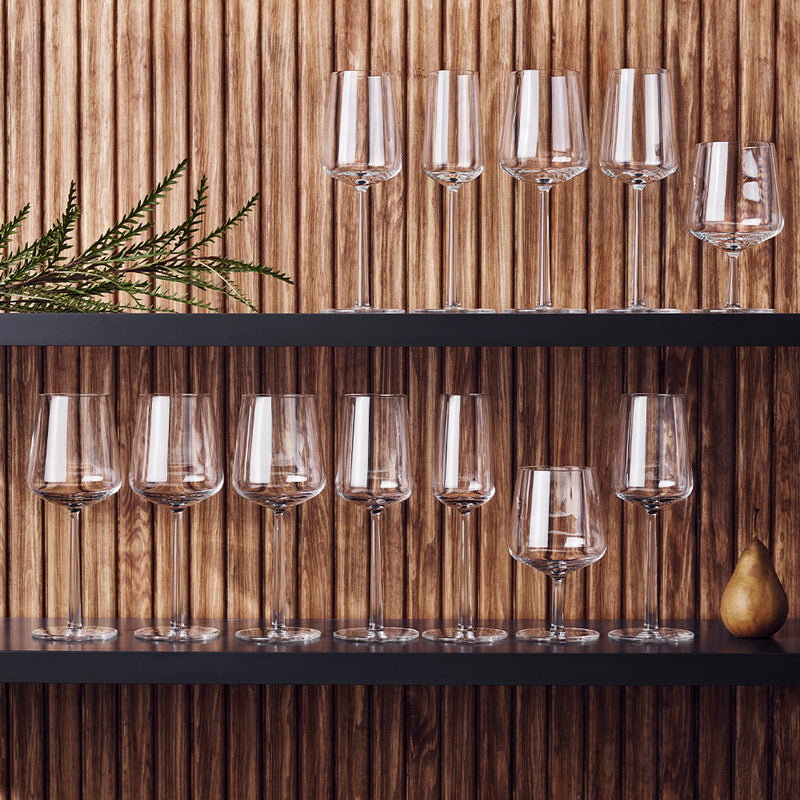 wooden shelving holding iittala essence wine glasses