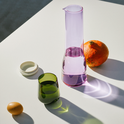 iittala Essence tumbler and water pitcher on white table