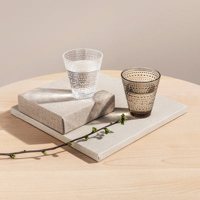 Kastehelmi clear and linen tumblers filled with water on tabletop