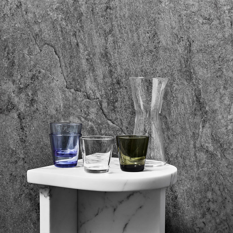 Kartio tumblers and pitcher on small marble table