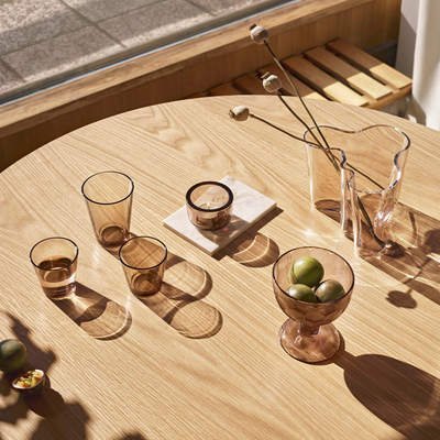 Iittala linen glass objects on wood table