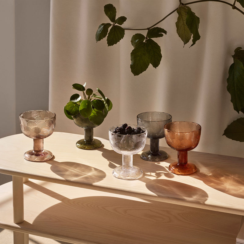 Miranda glass bowls displayed on wood shelf