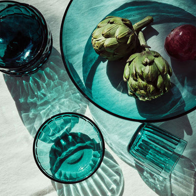 Raami Sea Blue glassware on table with natural shadows