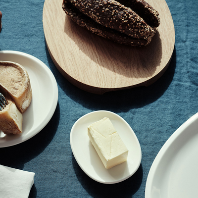 Block of butter on raami small plate