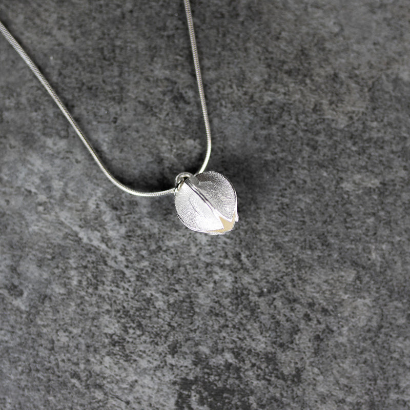 Kalevala Snow Flower Silver Necklace textured surface