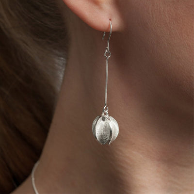 Kalevala Snow Flower Silver Earring worn in ear