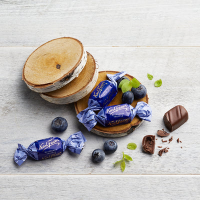 Individual pieces of Fazer Blueberry Truffle Milk Chocolate