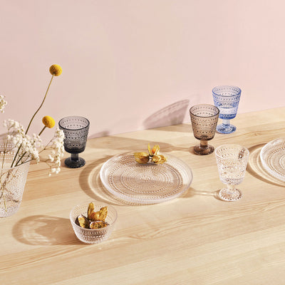 Tabletop of kastehelmi glasses and dinnerware