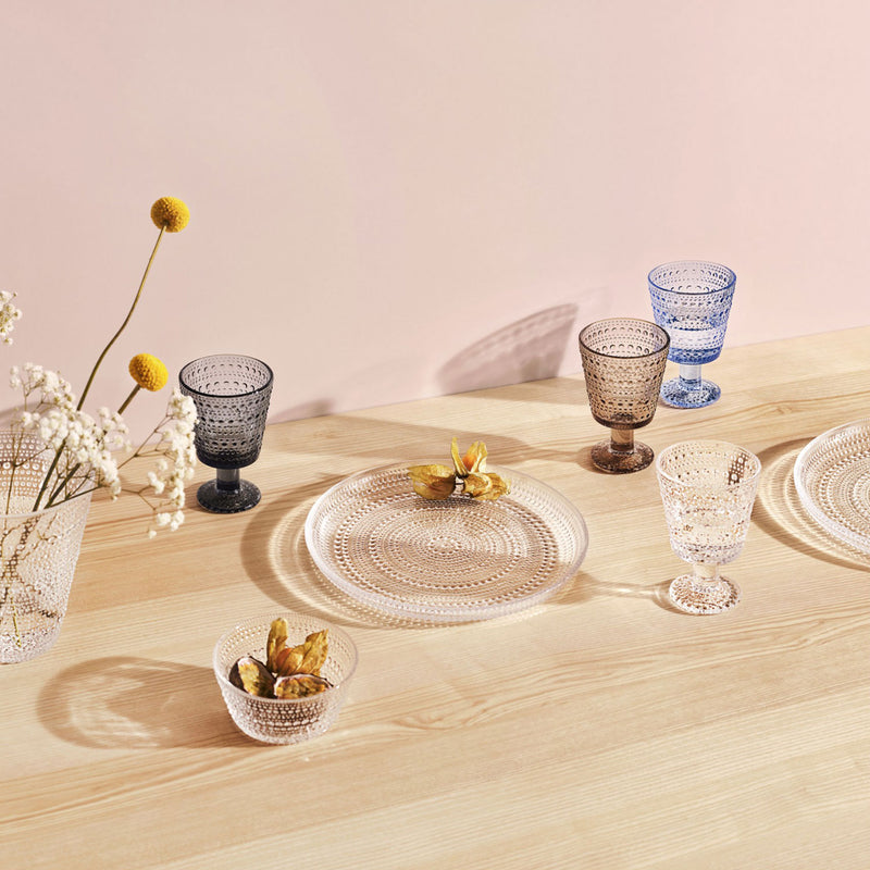 Kastehelmi tumblers, plate and dessert bowl on wood table